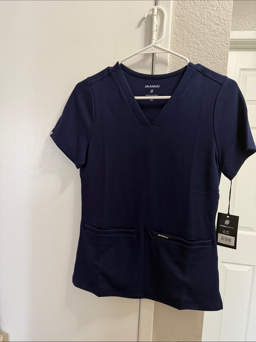 Jaanuu Women's Short Sleeve V-Neck Scrub Top in Navy